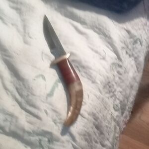Curved Handle Knife with Red and Tan Accents, This Is A True One Of A Kind.